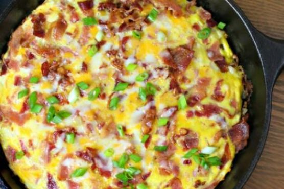 Cheesy Bacon Sausage Egg Hash Brown Skillet