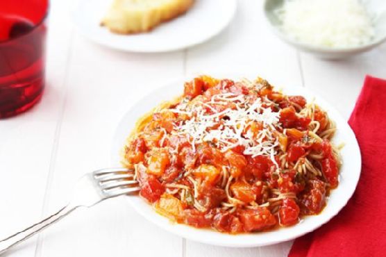 Heirloom Tomato Basil and Olive Oil Wine Sauce over Pasta