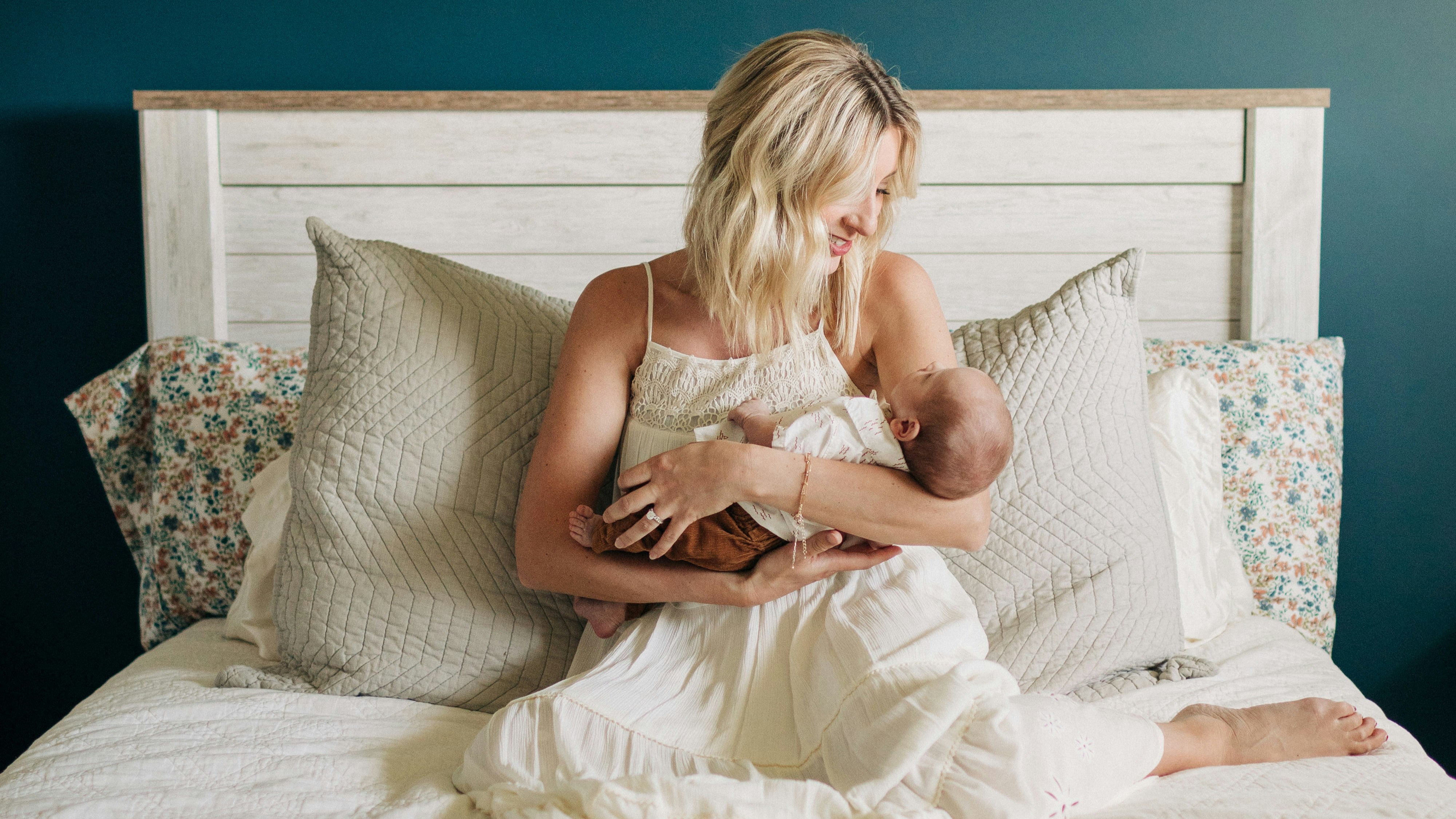New mom caressing baby